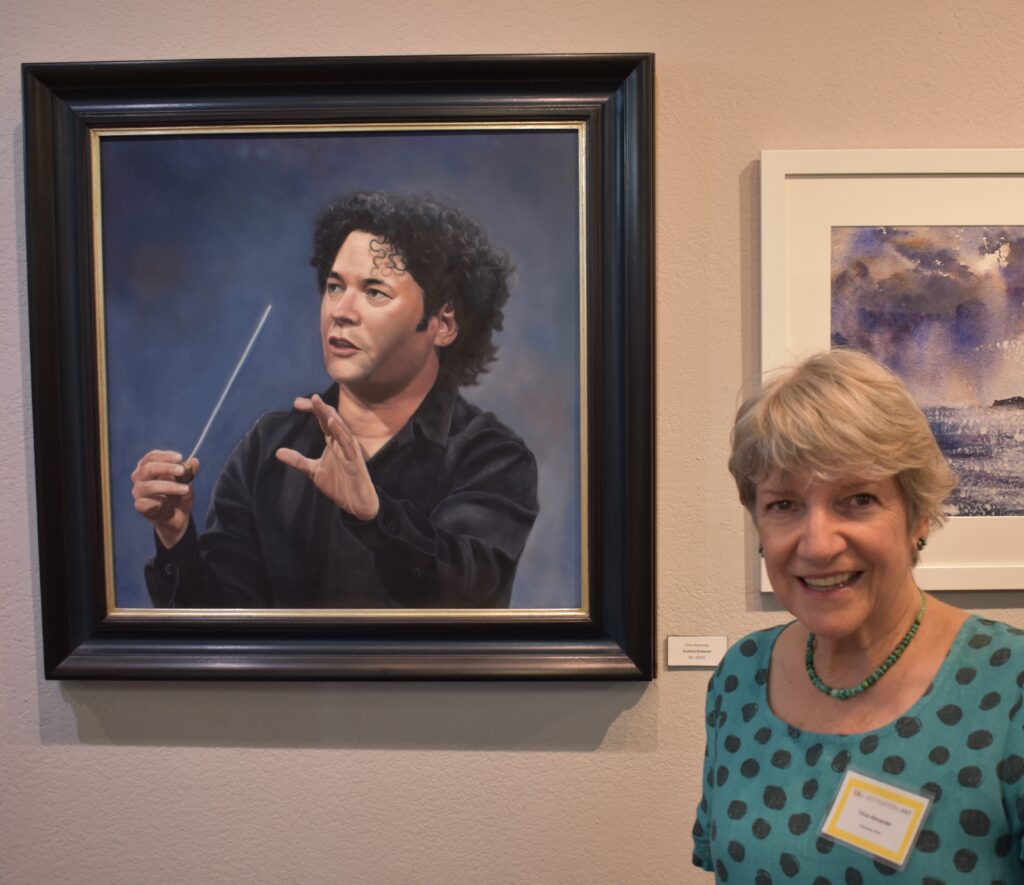 photo-of-tricia-with-dudamel-at-DA-reception